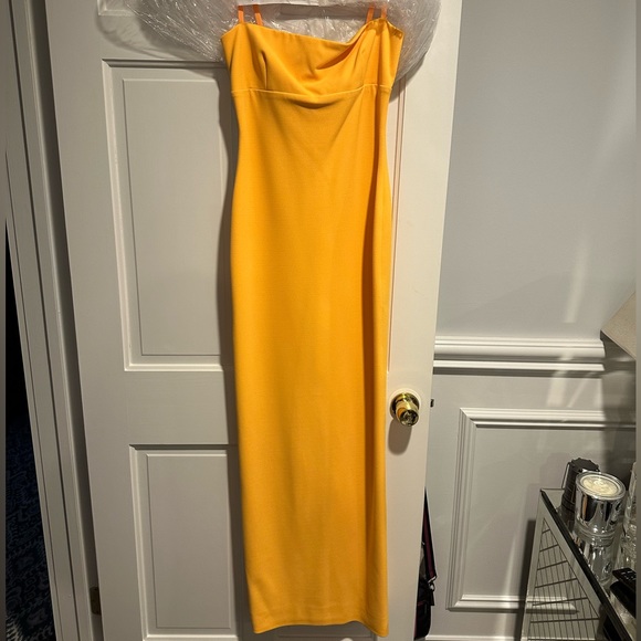 slim fit dress slacks The Kinsley Maxi Dress in Gold and Black – Solace London main image 0